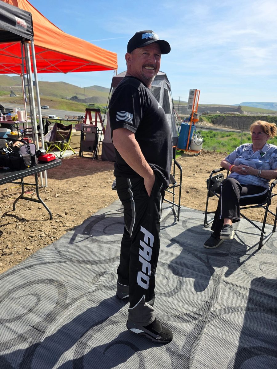 Scott Rapp, owner and driver of #36, smiling in the pits